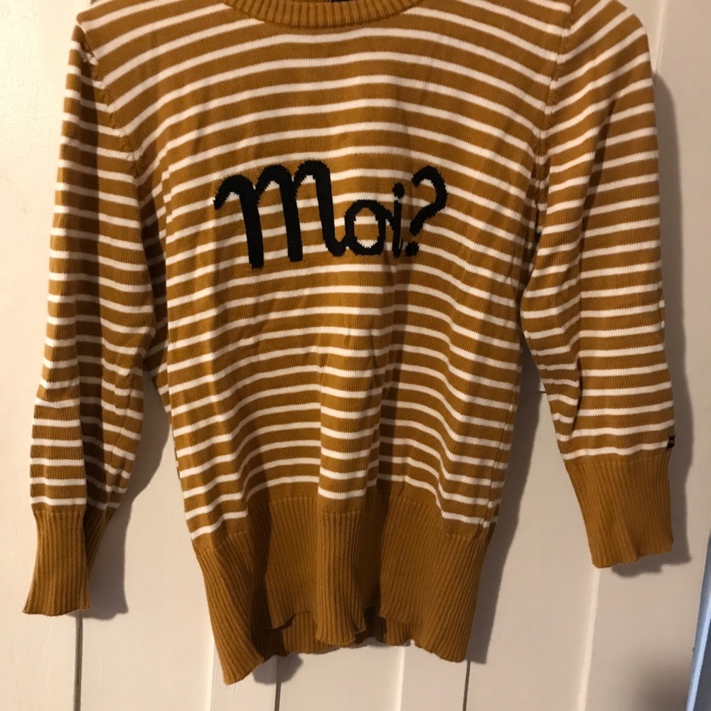 Fun striped “Moi?” sweater